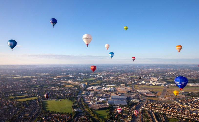 Hot air balloons flying over Bristol for the 2019 Balloon Fiesta press launch